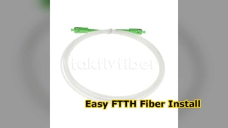 FTTH 2.0*3.0mmTransparan Tak Terlihat Serat Optik Dalam Ruangan Patchcord SCAPC ke SCAPC